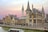 Historische Gebäude und Kanal in Gent bei Sonnenuntergang.